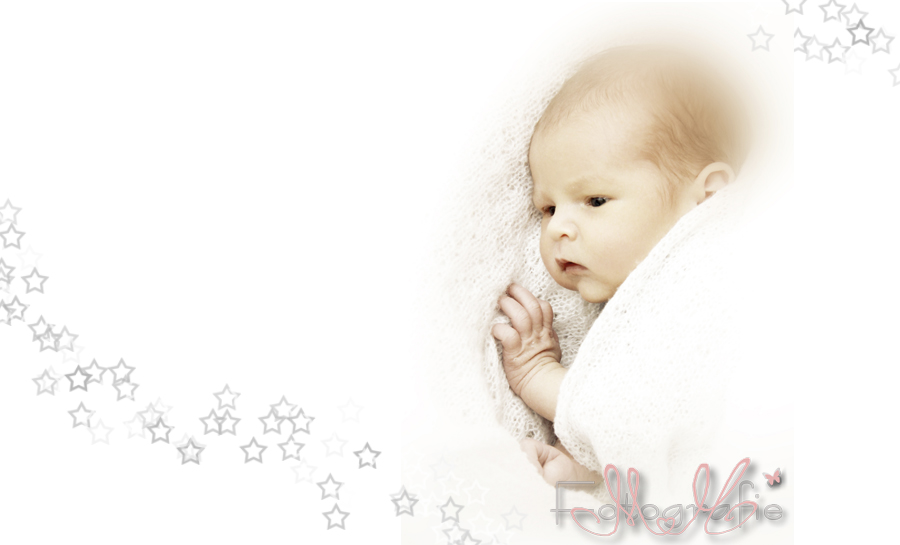 Farbfoto eines kleinen Babys in ganz zarten Farben.