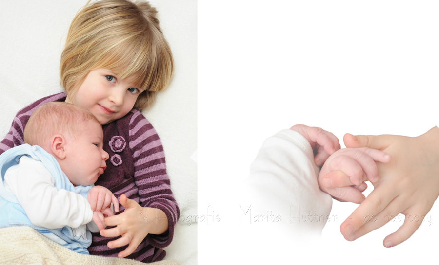 Baby mit großer Schwester - Babyhände